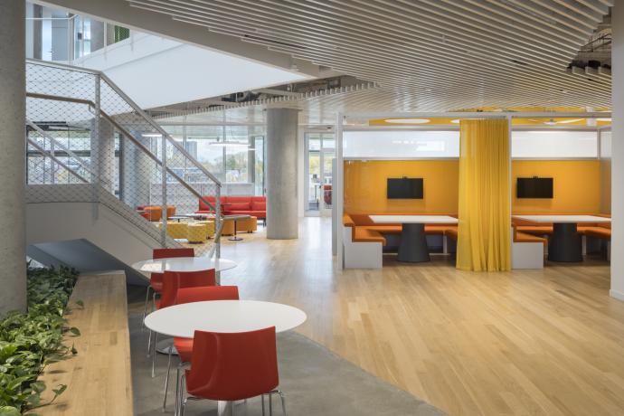 (Harvard Science and Engineering Complex in Allston, MA. The wood flooring & benches in the interior were provided by Pioneer Millworks. Photography by Brad Feinknopf Courtesy of Behnisch Architekten.)