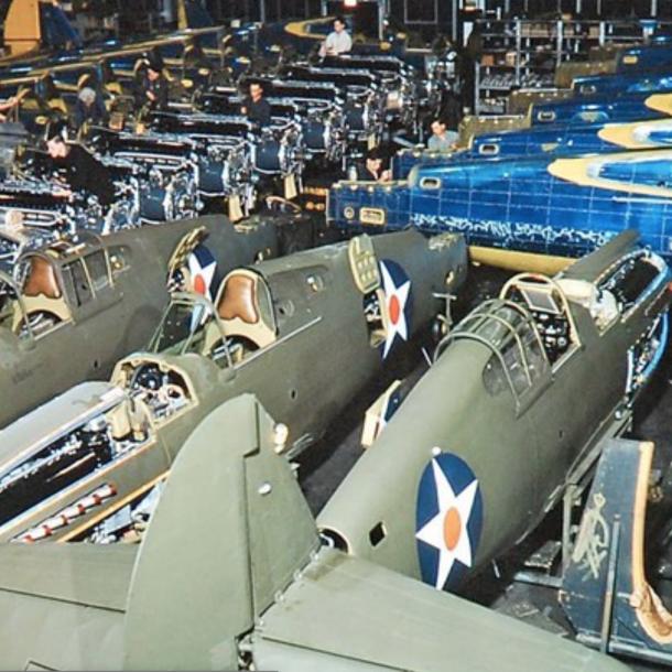 Pioneer Millworks reclaims wood from Curtiss Wright factory Buffalo NY image of plans in factory