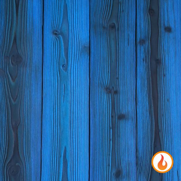 Shou Sugi Ban Larch Cobalt by Pioneer Millworks. Charred wood siding and paneling that is burned, brushed twice, and coated with an exterior oil
