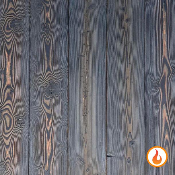 Shou Sugi Ban Larch Cinder by Pioneer Millworks. Charred wood siding and paneling that is burned, brushed twice, and coated with an exterior oil