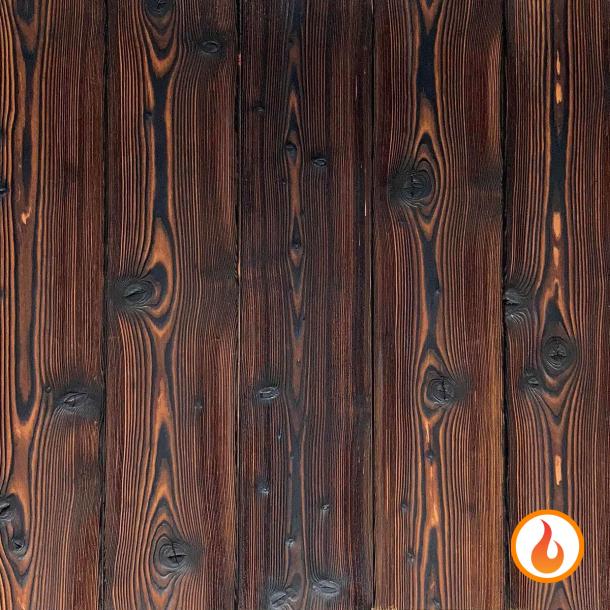 Shou Sugi Ban Larch Toasted by Pioneer Millworks. Charred wood siding and paneling that is burned, brushed twice, and coated with an exterior oil